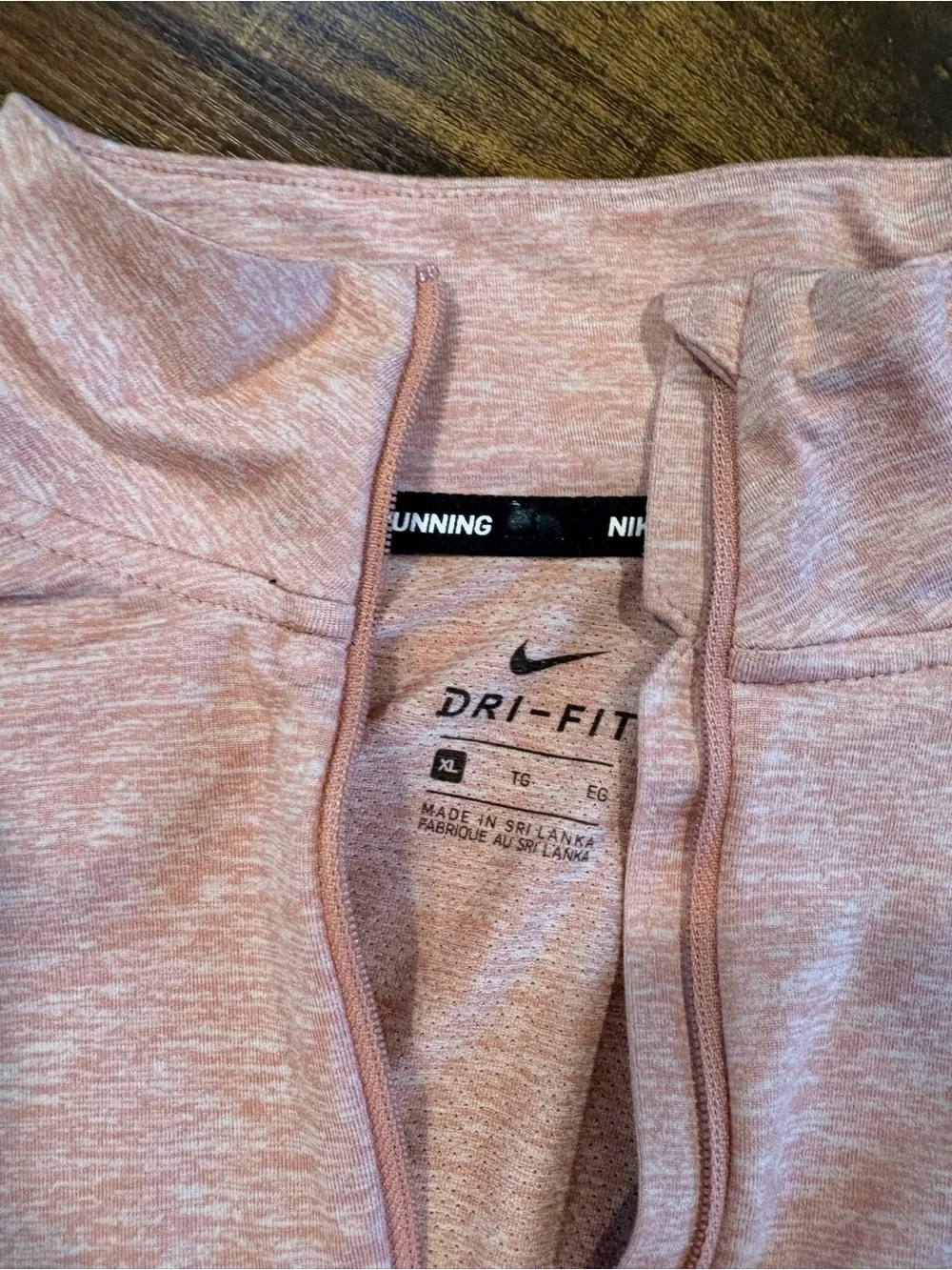 Nike Women’s Heathered Light Pink Dri-FIT Quarter-Zip Long Sleeve